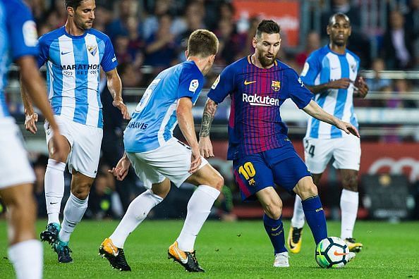 Malaga managed to stifle Messi but couldn't stop Barcelona
